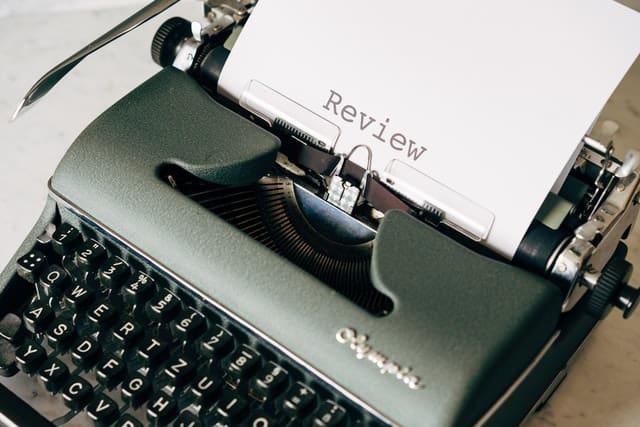 Typewriter with the word Review_Marketing content