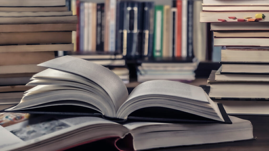 Books on the Table in the Middle of the Library